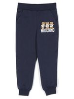 Moschino Kids pantalon de jogging à imprimé Teddy Bear - Bleu