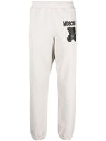 Moschino Teddy Bear-print organic-cotton track pants - Gris