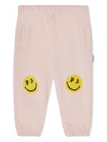 Palm Angels Kids pantalon de jogging à imprimé Smiley - Rose