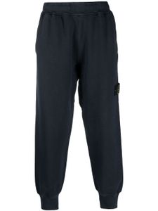 Stone Island pantalon de jogging à patch Compass - Bleu