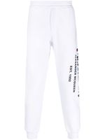 Alexander McQueen pantalon de jogging à logo imprimé - Blanc