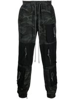 Mostly Heard Rarely Seen pantalon de jogging à imprimé camouflage - Gris