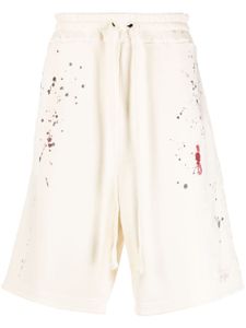 A-COLD-WALL* Studio paint-splatter cotton track shorts - Tons neutres