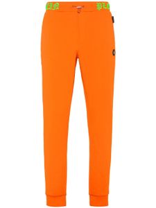 Philipp Plein pantalon de jogging Skull and Bones à taille logo - Orange