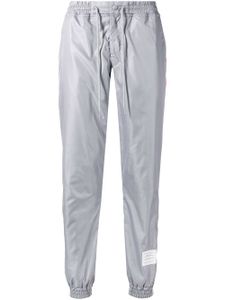 Thom Browne pantalon de jogging à détail rayé - Gris