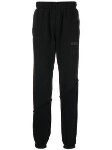 Represent pantalon de jogging à logo imprimé - Noir