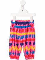 Stella McCartney Kids pantalon à imprimé géométrique - Rose