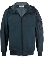 Stone Island veste légère à motif Compass signature - Bleu