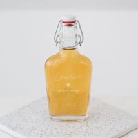 Glazen beugelfles met naam en hartje