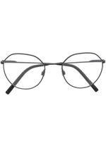 Dolce & Gabbana Eyewear lunettes de vue à monture ronde transparente - Noir