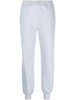 Alexander McQueen pantalon de jogging à logo imprimé - Bleu