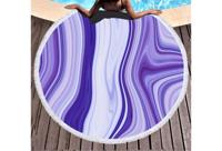 Nu 53% korting: Rond strandlaken met marmerlook