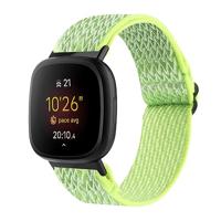 By Qubix - Compatible met Fitbit Versa 3/4 & Sense 1/2 Nylon loop bandje - Neon geel - Compatible fitbit bandje