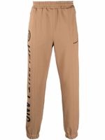 Helmut Lang pantalon de jogging à logo imprimé - Marron