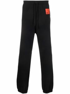 OAMC pantalon de jogging en coton à patch logo - Noir