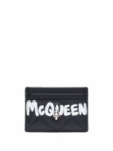 Alexander McQueen portefeuille matelassé à tête de mort - Noir