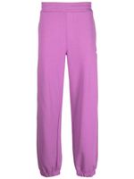 MSGM pantalon de jogging en coton à logo imprimé - Violet