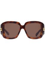 Gucci Eyewear lunettes de soleil à effet écaille de tortue - Marron