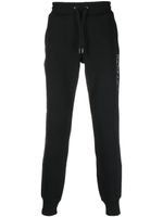 Tommy Hilfiger pantalon de jogging à logo - Noir