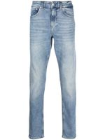 Calvin Klein Jeans jean slim à patch logo - Bleu