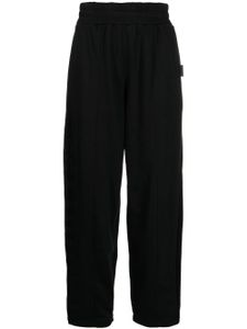 izzue pantalon de jogging à coupe ample - Noir