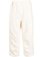 Maharishi pantalon de jogging crop à design asymétrique - Tons neutres