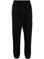 C.P. Company pantalon de jogging en coton à patch logo - Noir