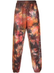 Aries pantalon de jogging à imprimé tie-dye - Orange