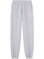 Versace pantalon de jogging en coton à logo imprimé - Gris