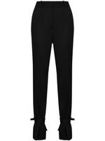 JW Anderson pantalon slim à cheville nouée - Noir