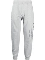 Alexander McQueen logo-print track pants - Gris