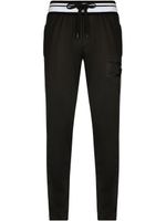 Dolce & Gabbana pantalon de jogging à bande logo - Noir