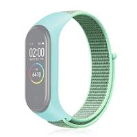 By Qubix - Nylon Geweven Bandje Compatible met Xiaomi Mi Band 3/4 / 5/6 / 7 - Mintgroen - Compatible Xiaomi bandje