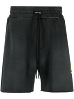 AMIRI short en coton à logo imprimé - Noir