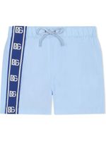 Dolce & Gabbana Kids short de bain à logo DG - Bleu