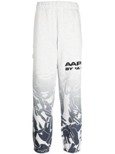 AAPE BY *A BATHING APE® pantalon de jogging à logo imprimé - Gris