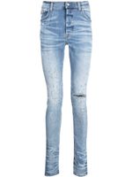 AMIRI jean slim à ornements en cristal - Bleu