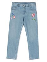 Versace Kids jean skinny à fleurs brodées - Bleu