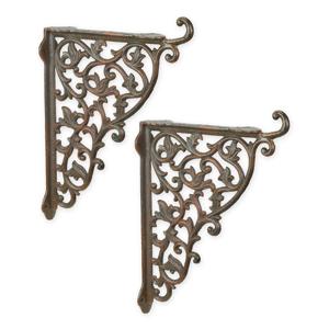 A PAIR OF CAST IRON WALL BRACKETS