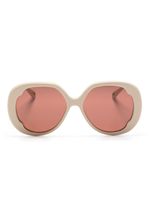 Chloé Eyewear lunettes de soleil oversize à logo imprimé - Tons neutres