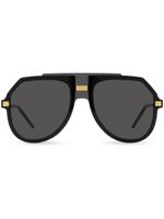 Dolce & Gabbana Eyewear lunettes de soleil oversize à logo gravé - Noir