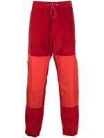 Moncler pantalon de jogging à design colour block - Rouge