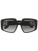 Dolce & Gabbana Eyewear lunettes de soleil oversize à plaque logo - Noir