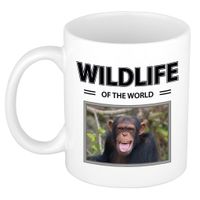 Chimpansee aap mok met dieren foto wildlife of the world - thumbnail