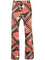 Valentino Garavani pantalon de pyjama à imprimé abstrait - Orange