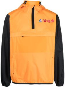 Comme Des Garçons Play veste à logo imprimé - Orange