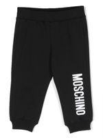 Moschino Kids logo-print tapered track pants - Noir