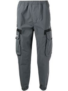 AAPE BY *A BATHING APE® pantalon fuselé à poches cargo - Gris