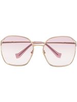 Miu Miu Eyewear lunettes de soleil à monture carrée oversize - Or