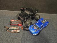 Tweedehands Traxxas Bigfoot incl. extra body, accu's en lader - thumbnail